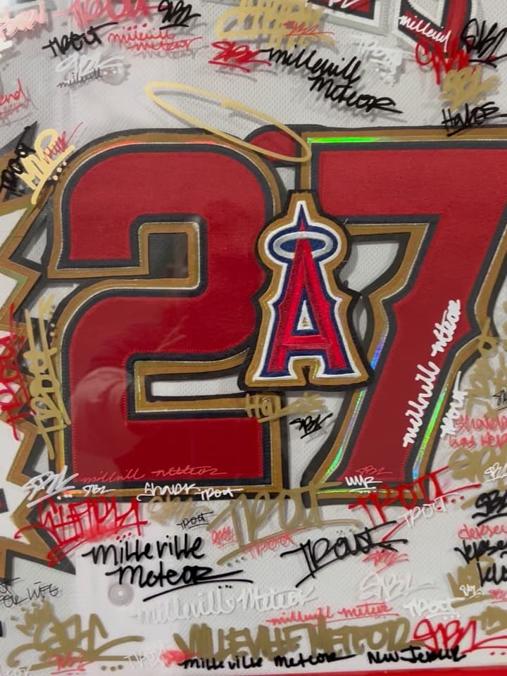Trout 27, Jersey Cuts. Cut from an official Angels jersey.